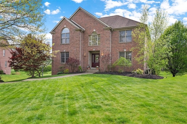 302 Castanea Dr, Cranberry Twp, PA 16066 - traditional-style home featuring brick siding and a front yard