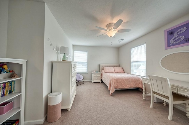 605 Saddle Ct, Moon/Crescent Twp, PA 15108 - bedroom with baseboards, visible vents, a ceiling fan, and light carpet