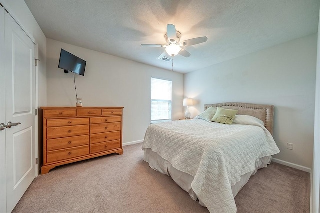 605 Saddle Ct, Moon/Crescent Twp, PA 15108 - carpeted bedroom featuring visible vents, ceiling fan, and baseboards