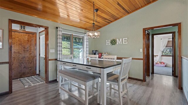 114 Silent Meadow Dr, Washington Twp Wml, PA 15632 - dining area featuring wood finished floors, lofted ceiling, baseboards, wood ceiling, and a chandelier