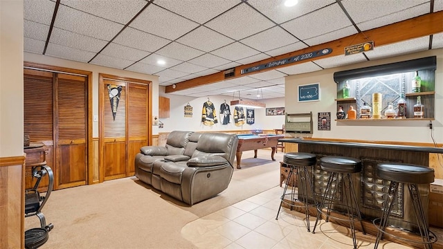 114 Silent Meadow Dr, Washington Twp Wml, PA 15632 - interior space featuring a bar, carpet flooring, and wainscoting