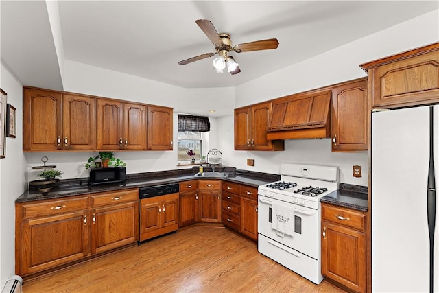 115 Grant Ave, Millvale, PA 15209 - kitchen with brown cabinets, custom range hood, baseboard heating, white appliances, and a ceiling fan