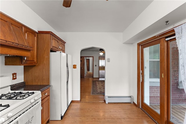 115 Grant Ave, Millvale, PA 15209 - kitchen featuring a baseboard heating unit, light wood finished floors, ceiling fan, and white appliances
