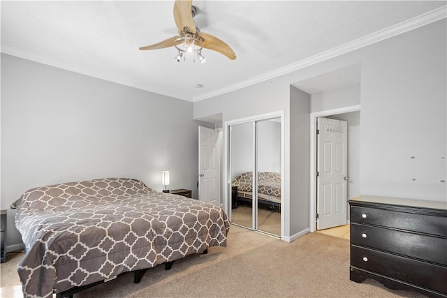 2113 Wharton St, South Side, PA 15203 - bedroom featuring light colored carpet, ceiling fan, baseboards, a closet, and ornamental molding
