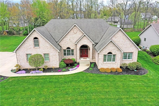 3461 Silver Ridge Ct, Hermitage, PA 16148 - french provincial home featuring roof with shingles, a front lawn, and brick siding