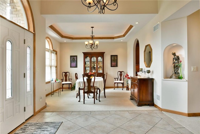 3461 Silver Ridge Ct, Hermitage, PA 16148 - entryway with a notable chandelier, visible vents, light carpet, and baseboards