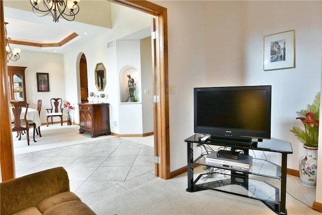 3461 Silver Ridge Ct, Hermitage, PA 16148 - tiled living area with a chandelier, baseboards, visible vents, and arched walkways