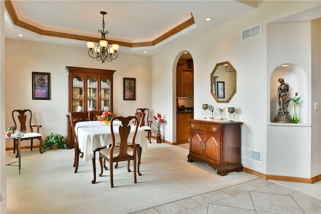 3461 Silver Ridge Ct, Hermitage, PA 16148 - dining area with baseboards, visible vents, arched walkways, and light colored carpet