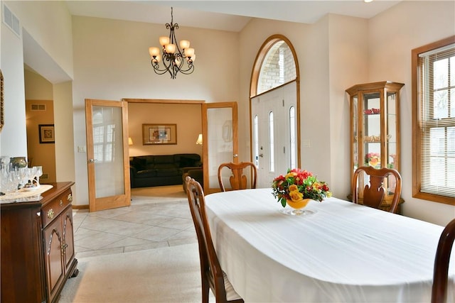 3461 Silver Ridge Ct, Hermitage, PA 16148 - dining room with visible vents, light tile patterned floors, a notable chandelier, and french doors