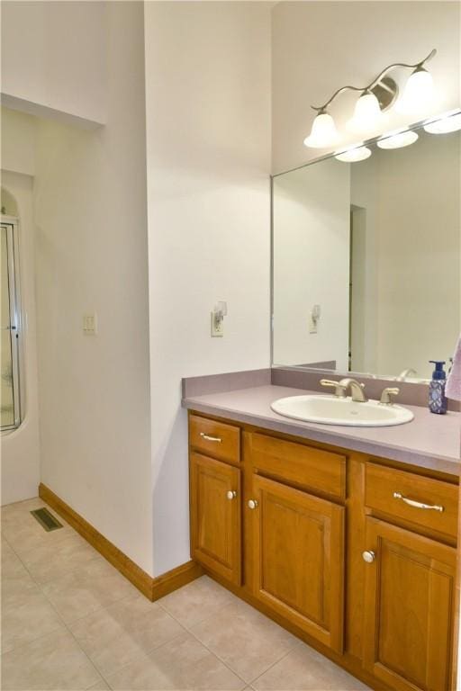 3461 Silver Ridge Ct, Hermitage, PA 16148 - full bath featuring tile patterned flooring, visible vents, an enclosed shower, and vanity