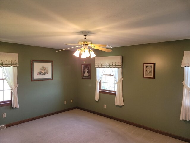 15 Willow Ln, Pine Twp Mer, PA 16127 - empty room with plenty of natural light, a ceiling fan, light colored carpet, and baseboards
