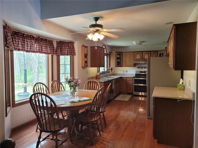 15 Willow Ln, Pine Twp Mer, PA 16127 - dining room with wood-type flooring, a ceiling fan, and baseboards