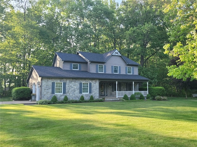 15 Willow Ln, Pine Twp Mer, PA 16127 - view of front of house with a porch, stone siding, a front lawn, an attached garage, and roof with shingles