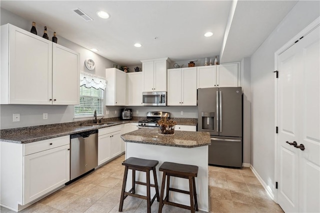 112 Aprilmae Way, Ross Twp, PA 15237 - kitchen with a sink, appliances with stainless steel finishes, white cabinets, and visible vents