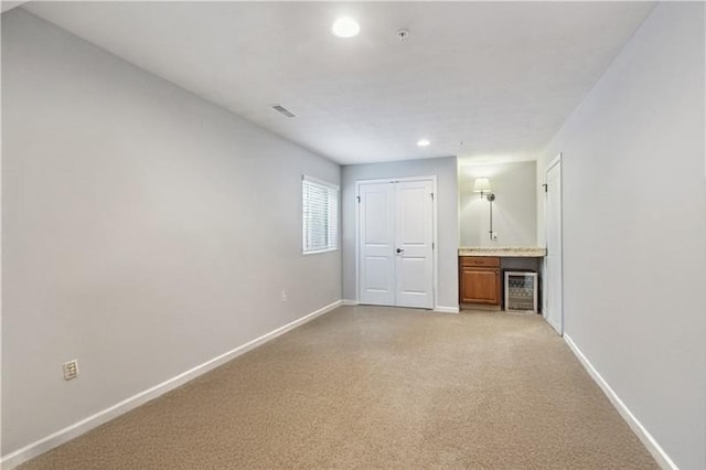 112 Aprilmae Way, Ross Twp, PA 15237 - interior space with visible vents, baseboards, recessed lighting, light colored carpet, and a dry bar