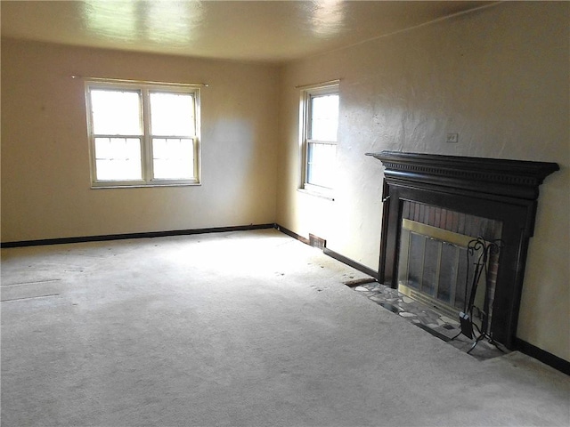 552 Crestline Dr, Baldwin Twp, PA 15234 - unfurnished living room with a fireplace with flush hearth, baseboards, and carpet
