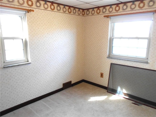 552 Crestline Dr, Baldwin Twp, PA 15234 - empty room with plenty of natural light, carpet flooring, baseboards, and wallpapered walls