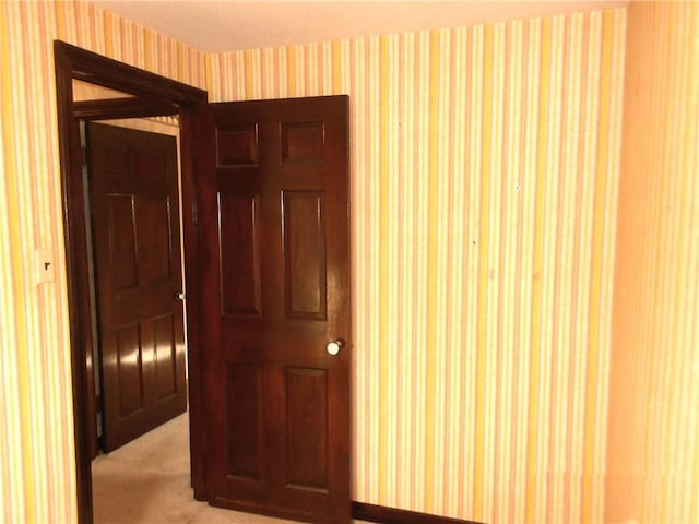 552 Crestline Dr, Baldwin Twp, PA 15234 - empty room featuring light colored carpet and wallpapered walls