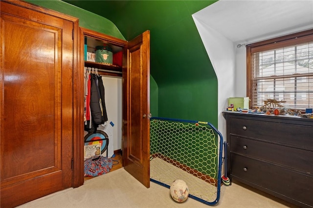 carpeted bedroom featuring a closet