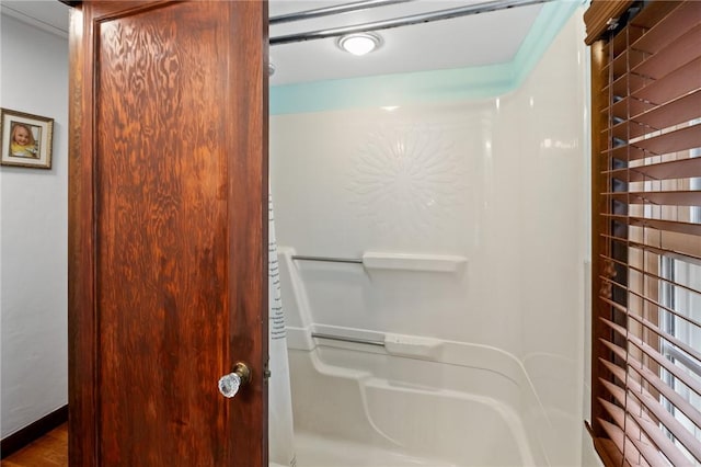 bathroom featuring walk in shower