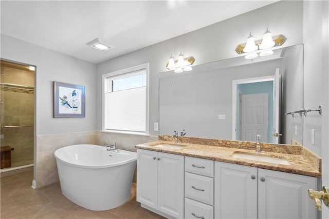 205 Prestonwood Ln, Peters Twp, PA 15317 - full bath featuring double vanity, a sink, a soaking tub, and a stall shower