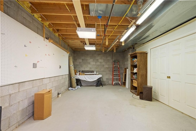 205 Prestonwood Ln, Peters Twp, PA 15317 - unfinished below grade area featuring concrete block wall and a workshop area