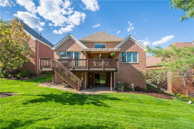 205 Prestonwood Ln, Peters Twp, PA 15317 - back of house with a yard, brick siding, a wooden deck, and stairs