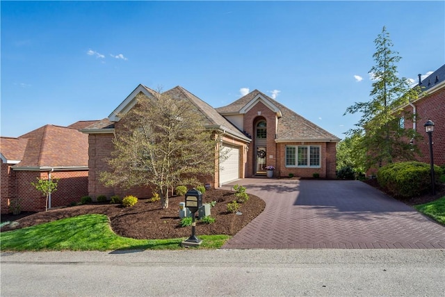 205 Prestonwood Ln, Peters Twp, PA 15317 - view of front of home featuring a garage, decorative driveway, and brick siding