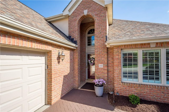 205 Prestonwood Ln, Peters Twp, PA 15317 - property entrance featuring a shingled roof and brick siding