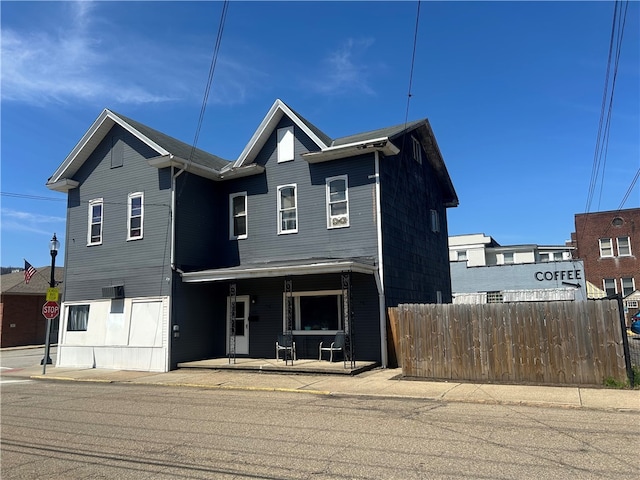403 E 2nd Ave, Tarentum, PA 15084 - view of front of home with a porch and fence
