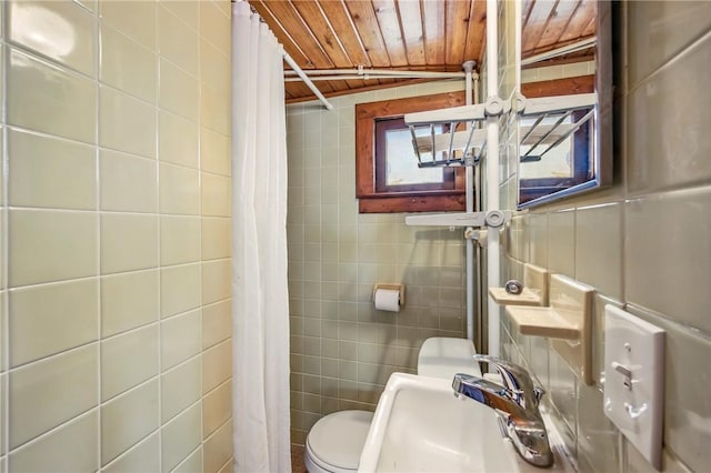 875 Hillside Rd, Jamestown Cra, PA 16134 - bathroom with tile walls, a sink, wooden ceiling, toilet, and a shower with shower curtain