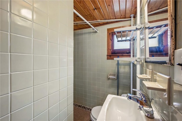 875 Hillside Rd, Jamestown Cra, PA 16134 - bathroom featuring wood ceiling, tile walls, a sink, tile patterned floors, and toilet