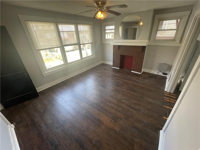 119-121 Giffin Ave, Mount Oliver, PA 15210 - unfurnished living room with baseboards, dark wood-style floors, a ceiling fan, and a brick fireplace