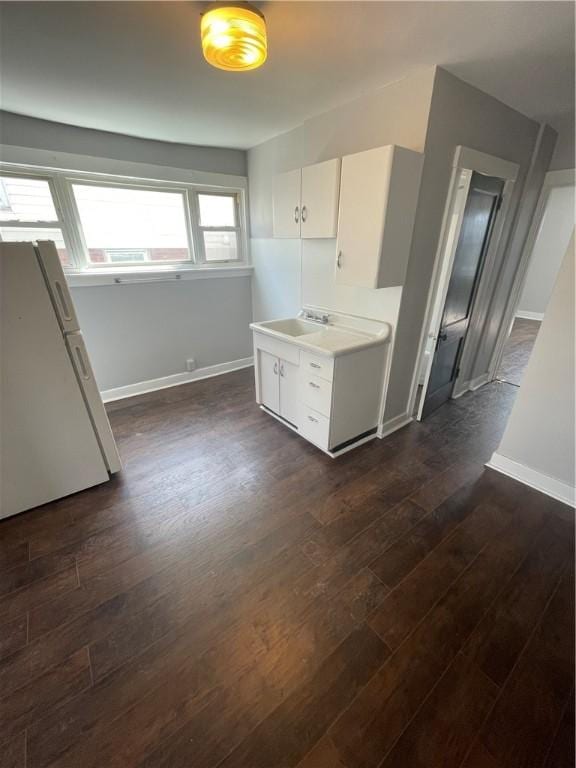 119-121 Giffin Ave, Mount Oliver, PA 15210 - kitchen featuring freestanding refrigerator, dark wood-style floors, baseboards, and light countertops
