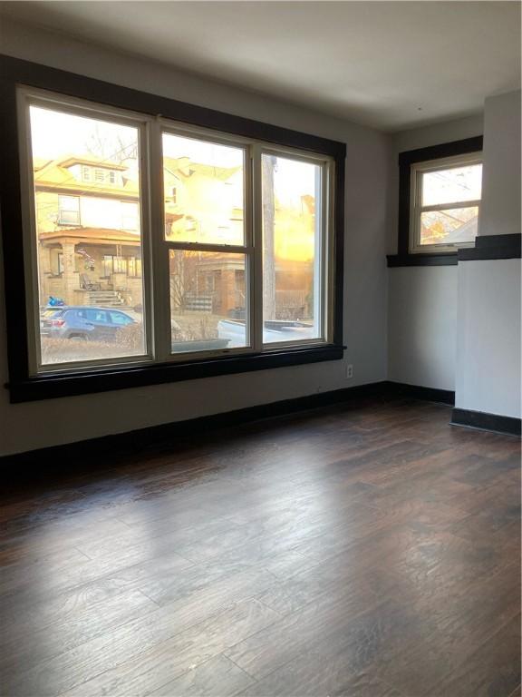 119-121 Giffin Ave, Mount Oliver, PA 15210 - spare room with dark wood-type flooring and baseboards