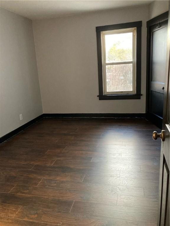 119-121 Giffin Ave, Mount Oliver, PA 15210 - empty room with dark wood-style floors and baseboards