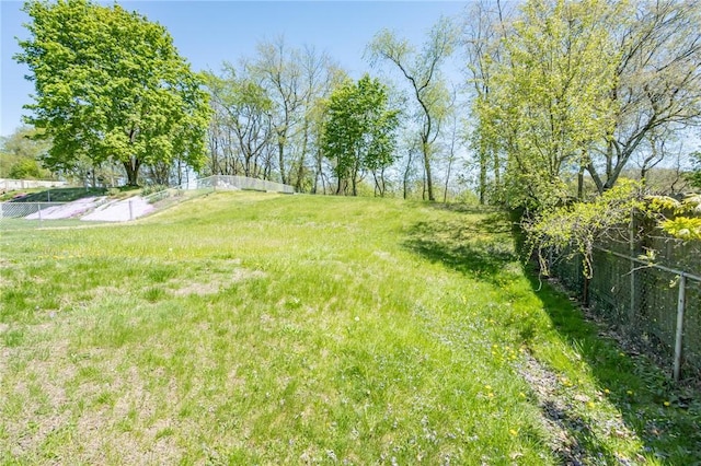 view of yard with fence
