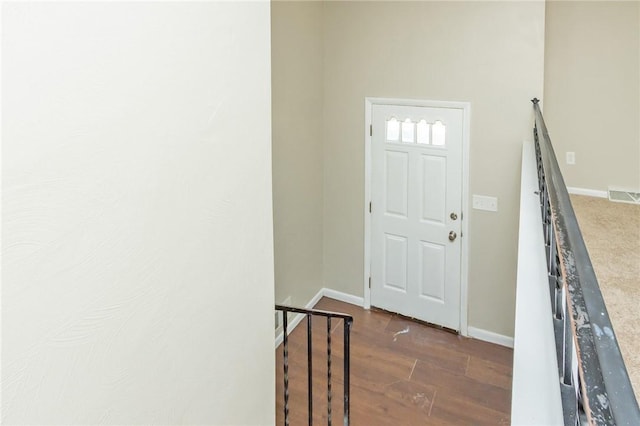 1004 Mcallister Dr, Plum Boro, PA 15068 - foyer entrance with dark wood-type flooring and baseboards
