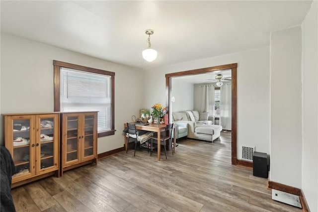 715-717 Hiland Ave, Coraopolis, PA 15108 - dining space with baseboards, visible vents, and wood finished floors
