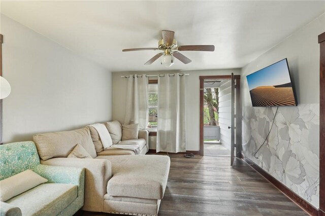 715-717 Hiland Ave, Coraopolis, PA 15108 - living area featuring baseboards, ceiling fan, and dark wood-style flooring