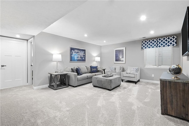 living room featuring carpet flooring, recessed lighting, and baseboards