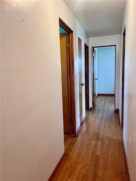2144 Highland Dr, Summit Twp But, PA 16002 - corridor with baseboards and wood finished floors