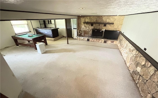 2144 Highland Dr, Summit Twp But, PA 16002 - playroom with carpet floors, billiards, a textured ceiling, and a stone fireplace
