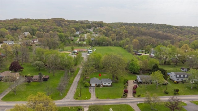 aerial view featuring a forest view