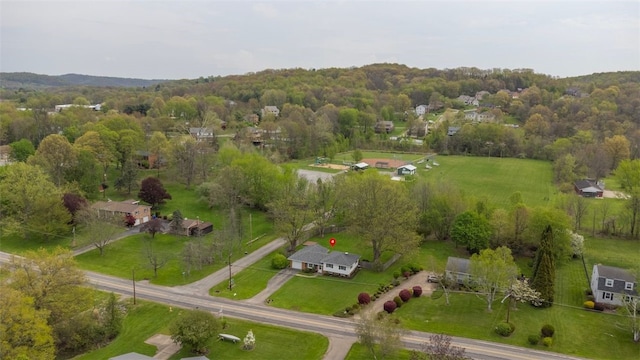 drone / aerial view with a view of trees
