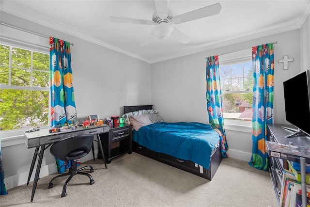 bedroom with ornamental molding, ceiling fan, and carpet flooring