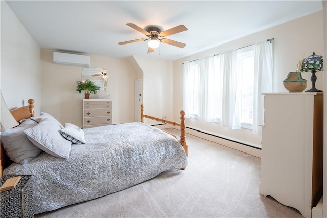 bedroom with a ceiling fan, baseboard heating, baseboards, an AC wall unit, and carpet