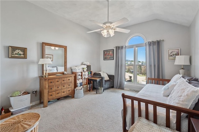 bedroom with light colored carpet, ceiling fan, and lofted ceiling