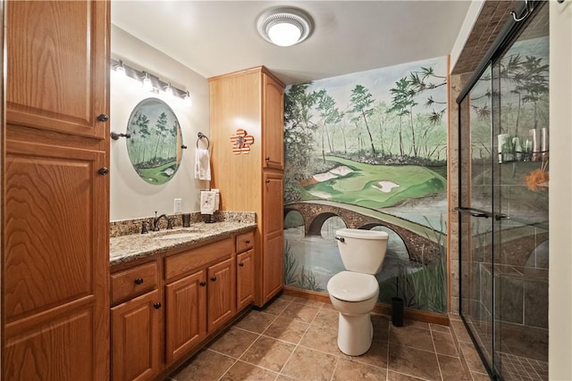 full bath featuring toilet, tiled shower, tile patterned flooring, and vanity