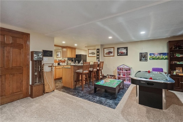 rec room with carpet floors and recessed lighting